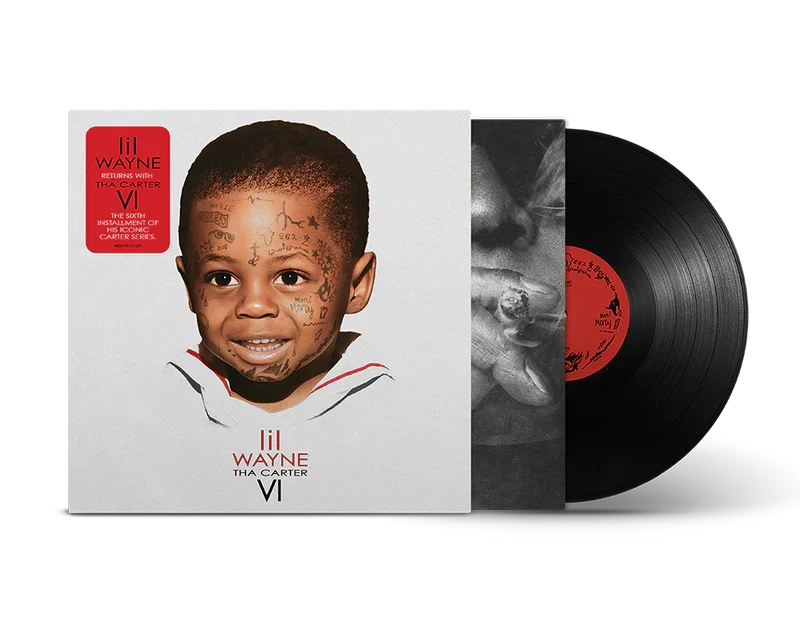 Vinyl album sleeve showing a smiling child with facial tattoos and Lil Wayne Tha Carter VI branding; red sticker on white cover, record partially pulled out outward.