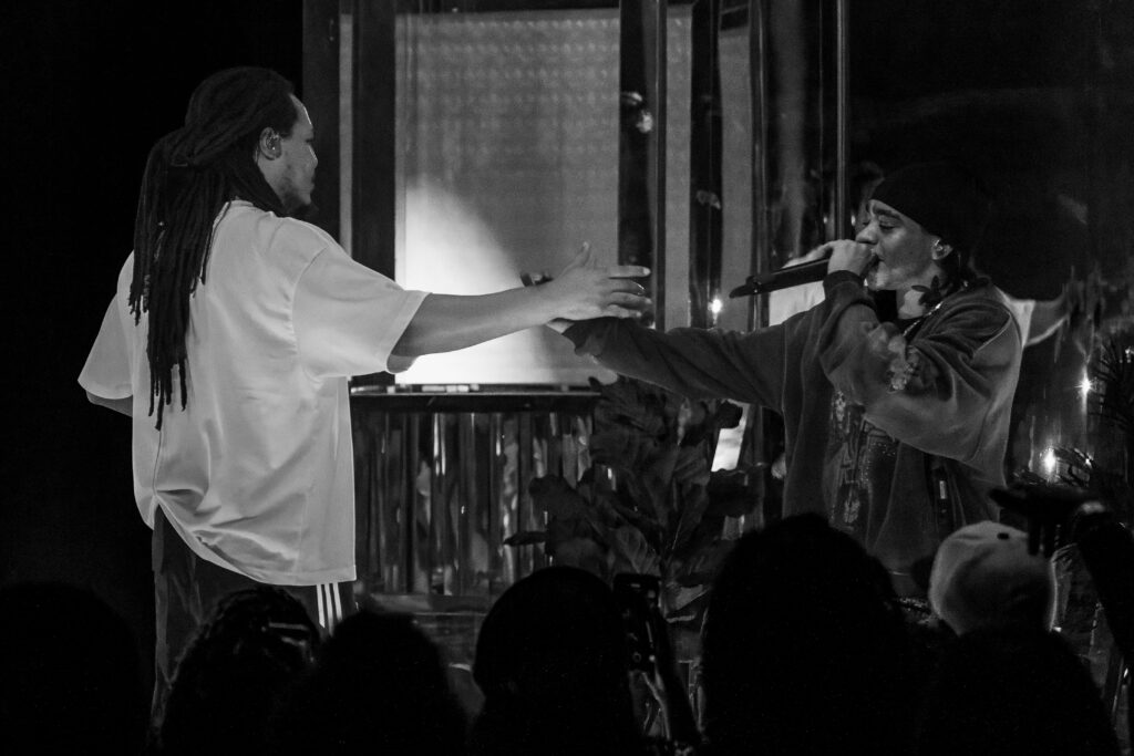Domani greets King Harris onstage during the Succession Tour concert at The Echo in Los Angeles.