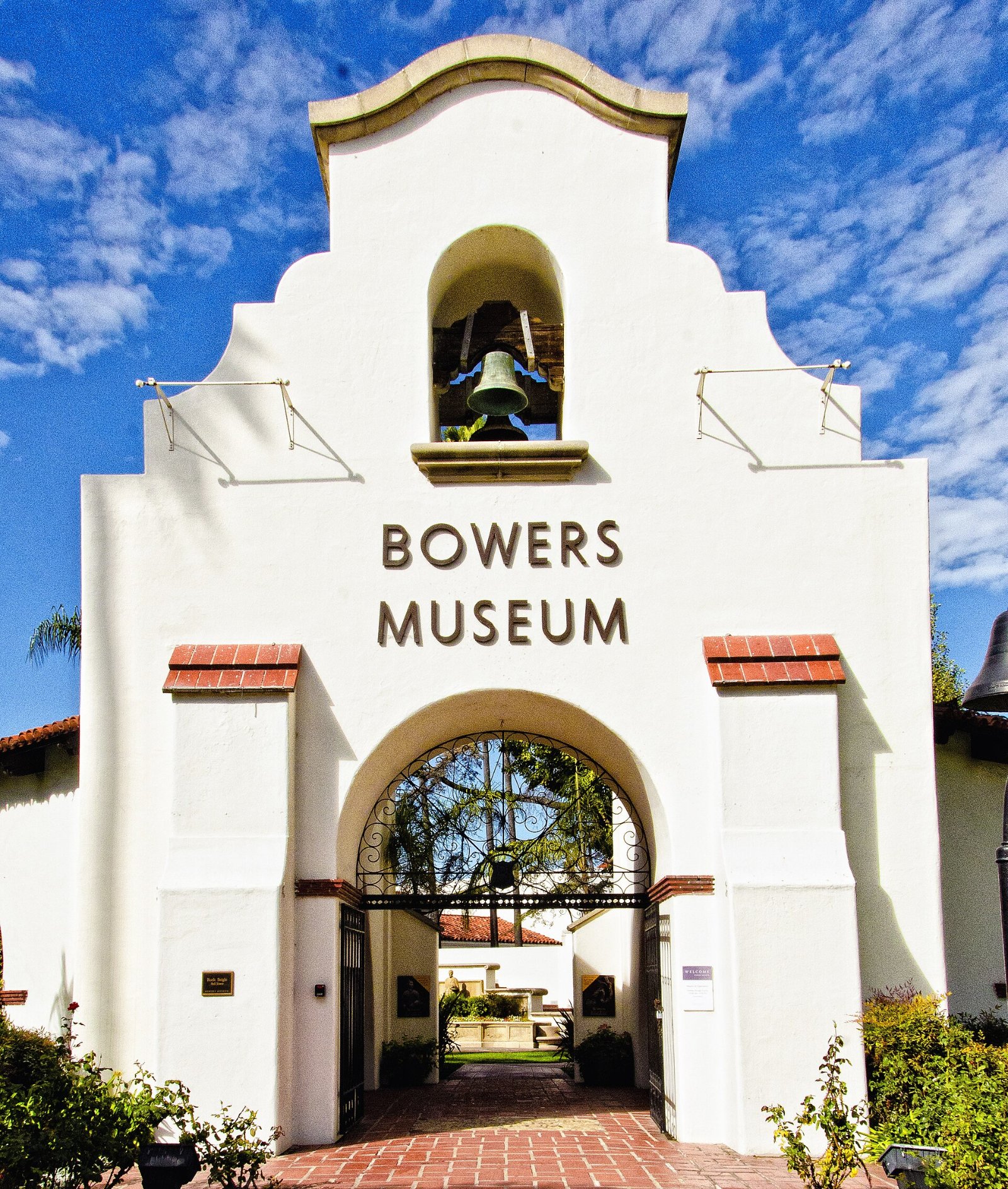 Mission-style entrance and bell tower of the Bowers Museum in Santa Ana