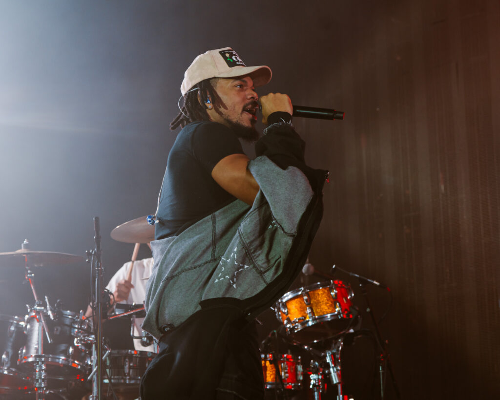 Chance the Rapper at Hollywood Palladium, Los Angeles, September 20, 2026 (1) – The 824 Journal Chance the Rapper performing with a denim jacket in hand, drum kit behind him at the Hollywood Palladium.