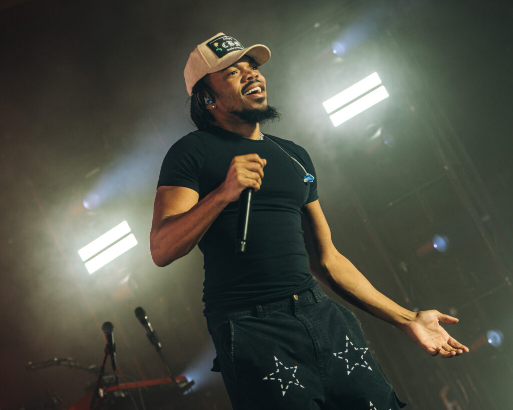 Chance the Rapper at Hollywood Palladium, Los Angeles, September 20, 2026 (23) – The 824 Journal Chance the Rapper singing with his arms spread under bright white stage lights at the Hollywood Palladium.