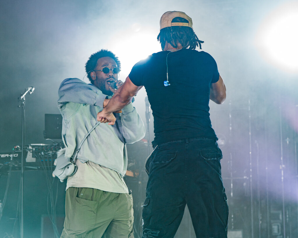 Chance the Rapper at Hollywood Palladium, Los Angeles, September 20, 2026 (27) – The 824 Journal Chance the Rapper at the Hollywood Palladium: two male performers on stage; one facing the audience wearing sunglasses and a light jacket, mic in hand.