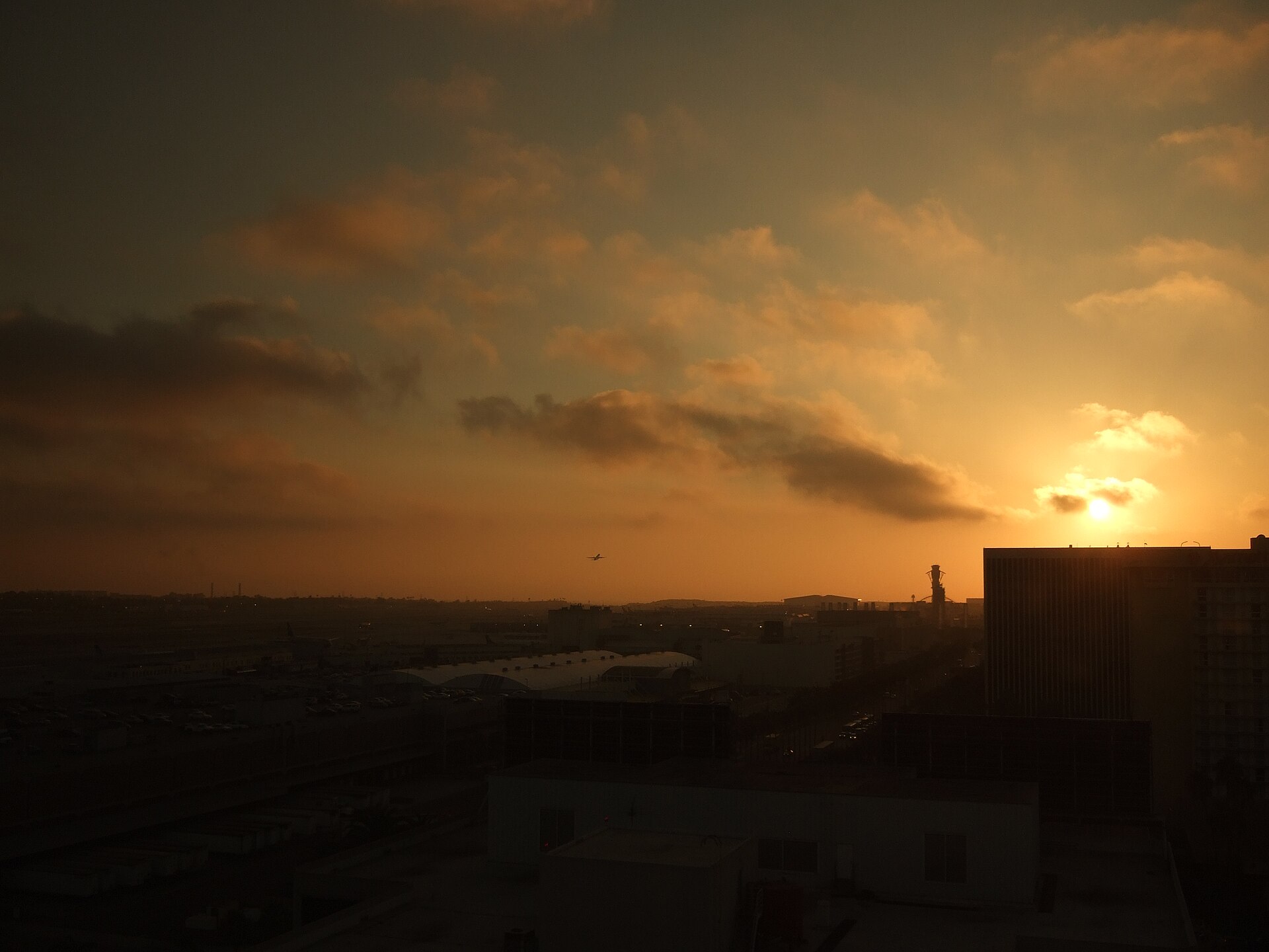 Sunset over the low skyline of the Los Angeles airport area, seen from the 14th floor of the Hilton Los Angeles Airport