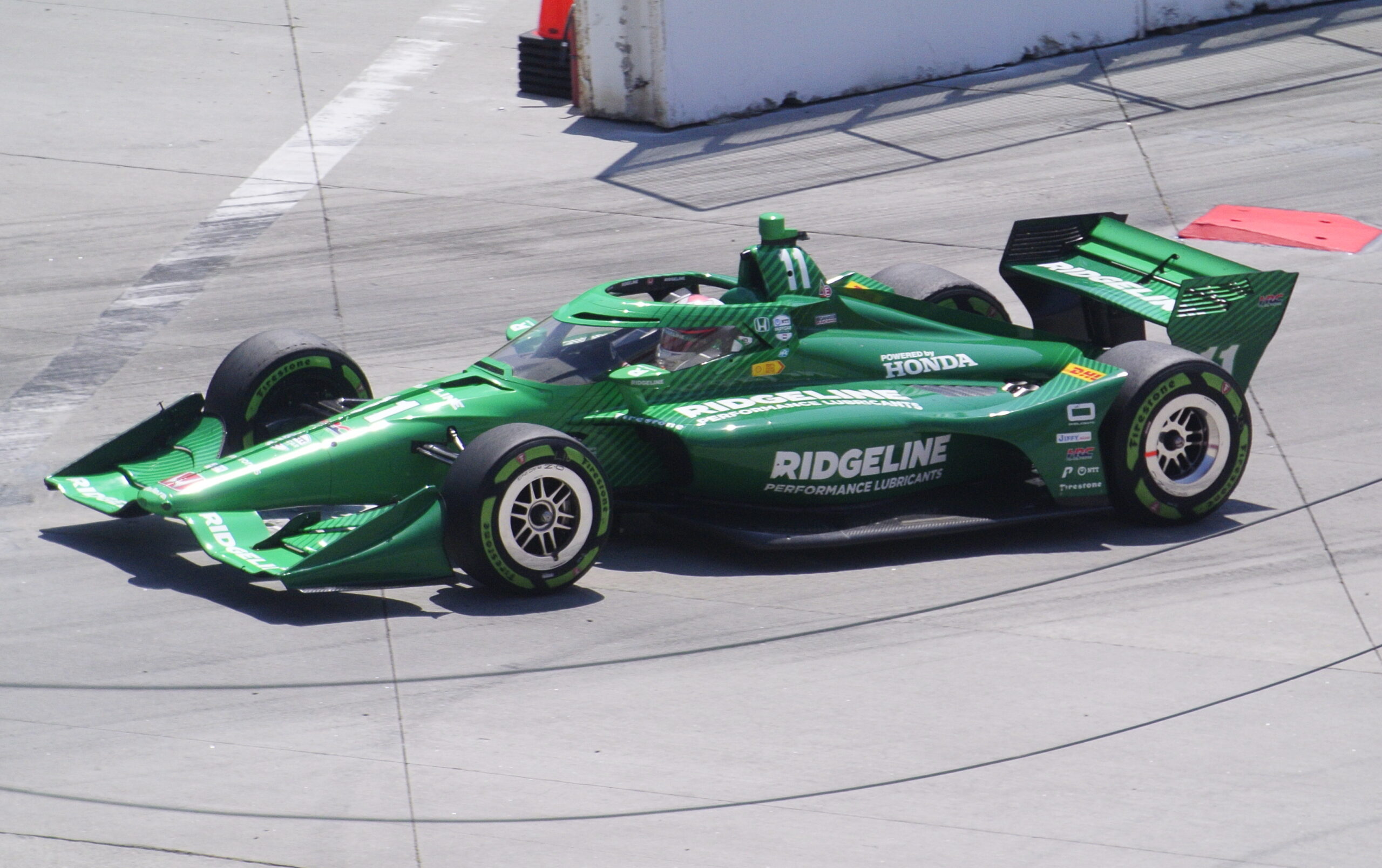Marcus Armstrong's Chip Ganassi Racing Honda IndyCar on the street circuit at the 2024 Grand Prix of Long Beach.