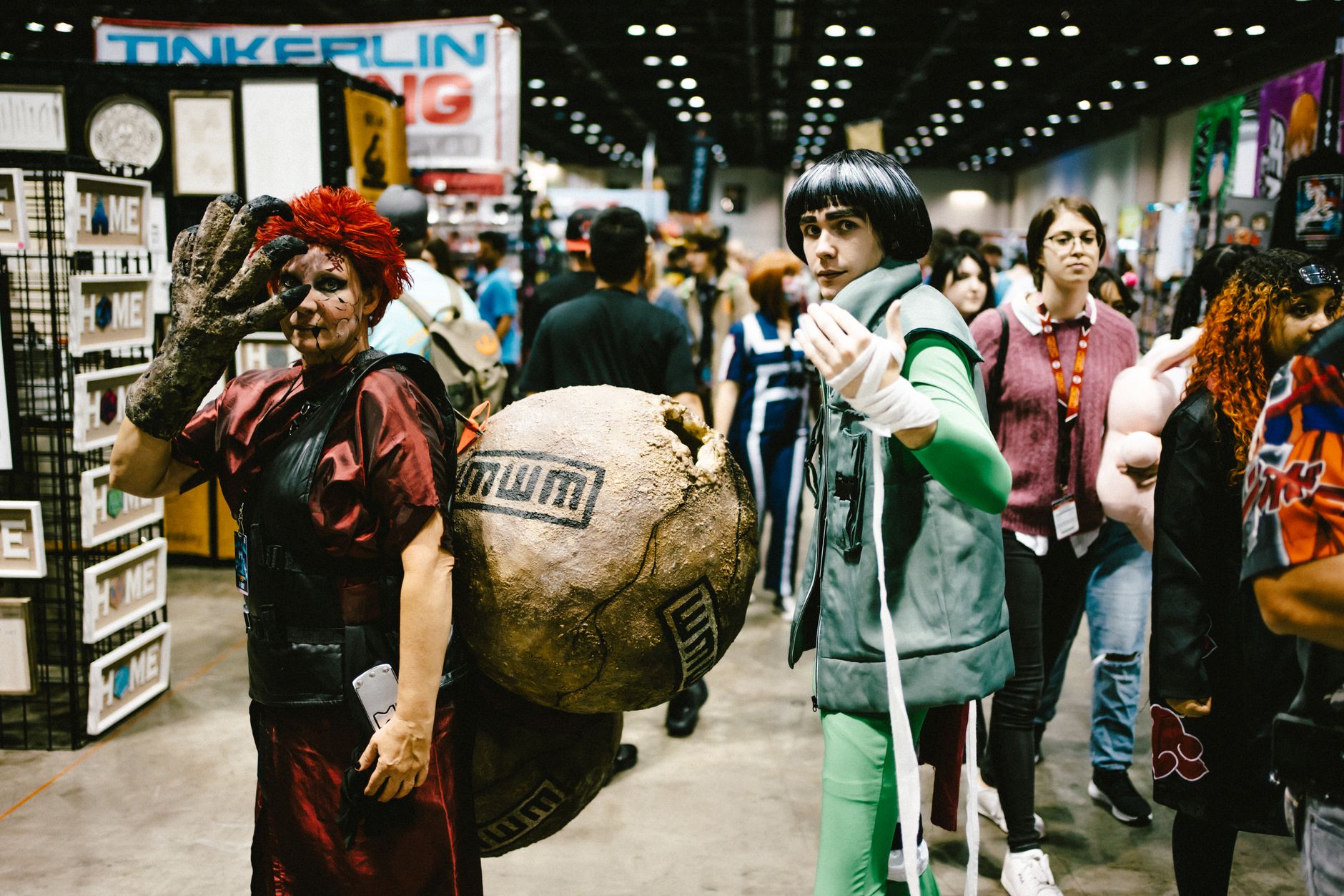 men cosplaying gaara and lee