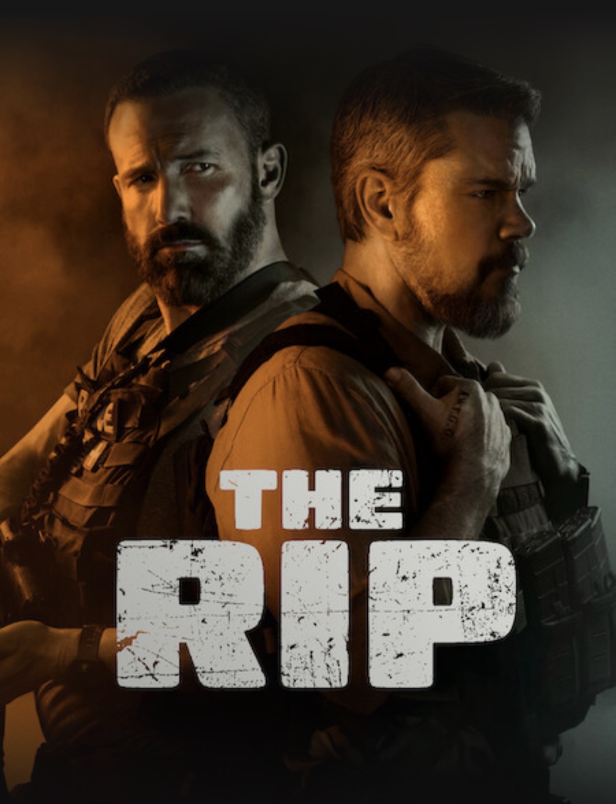 Key art for The Rip showing two bearded men in tactical gear.