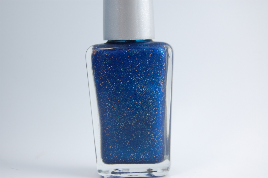 Bottle of blue nail polish